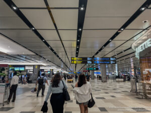 people walking in a large airport