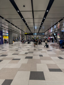 people walking in a large airport