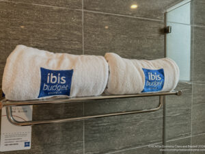 towels on a rack in a bathroom