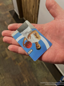a hand holding a card