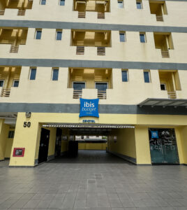 a building with a blue sign