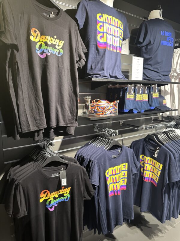 a display of t-shirts on swingers