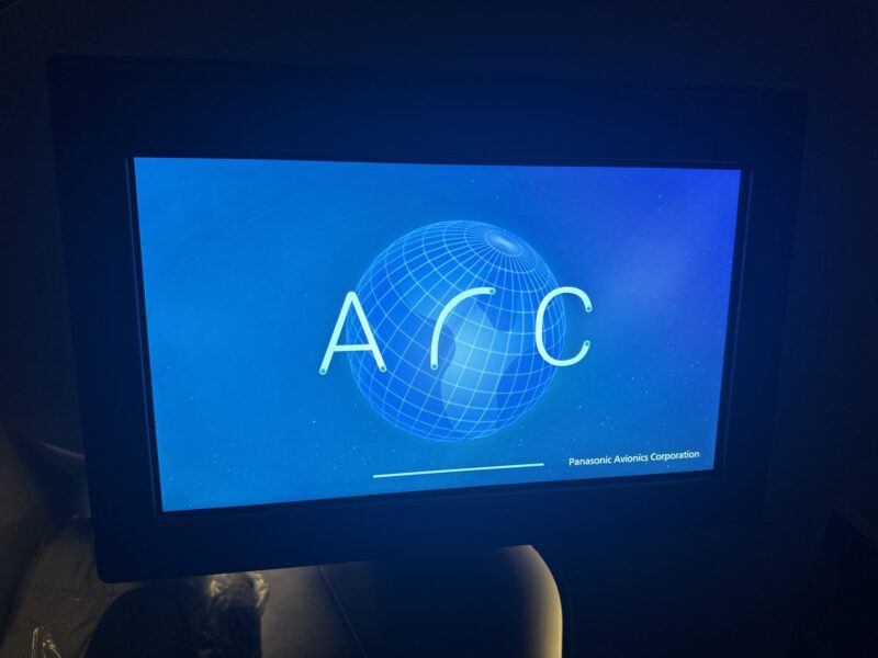 a screen with a globe and text on it