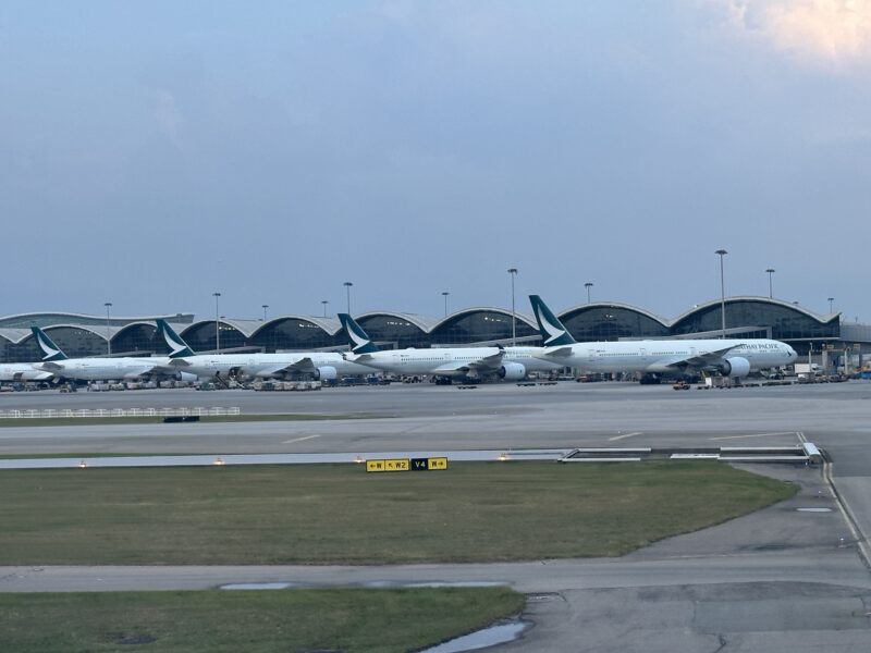 airplanes parked on a runway