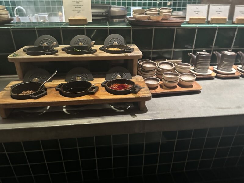 a kitchen counter with bowls and bowls