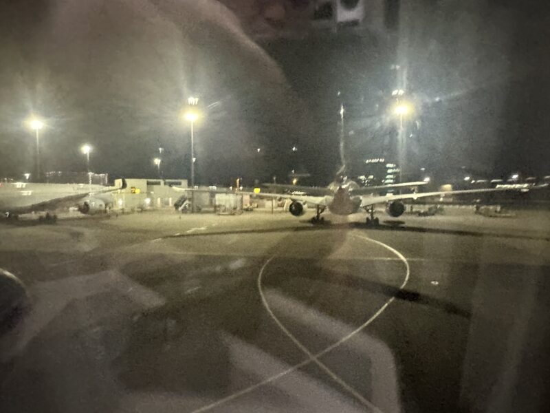 an airplane on a runway at night