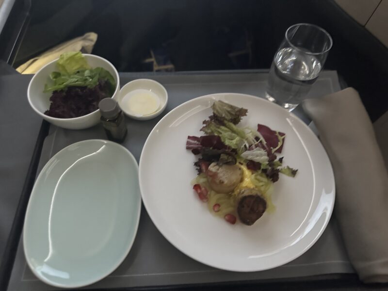 a plate of food on a tray