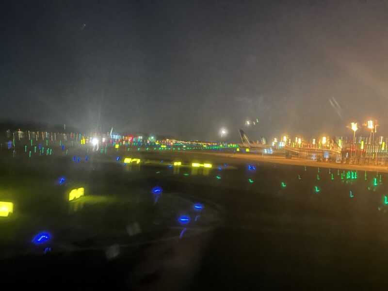 a runway at night with lights