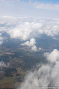 aerial view of clouds and land