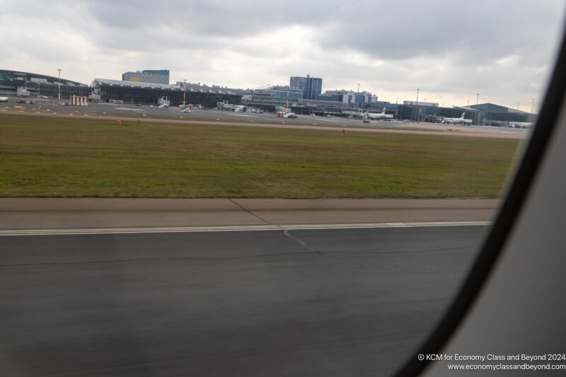 a runway with a building in the background