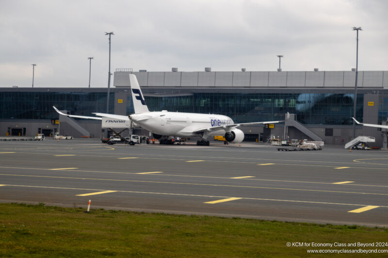 a white airplane on a tarmac