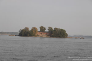 a building on an island in the middle of a body of water