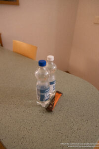 two plastic bottles on a table