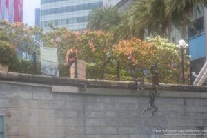 a group of statues on a wall