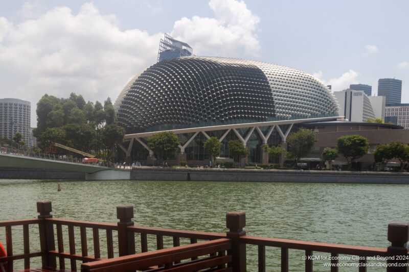 Esplanade – Theatres on the Bay with a large dome on top and trees next to a body of water