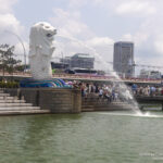 a statue of a lion spraying water from a fountain