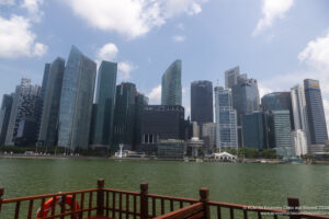 a city skyline with a body of water