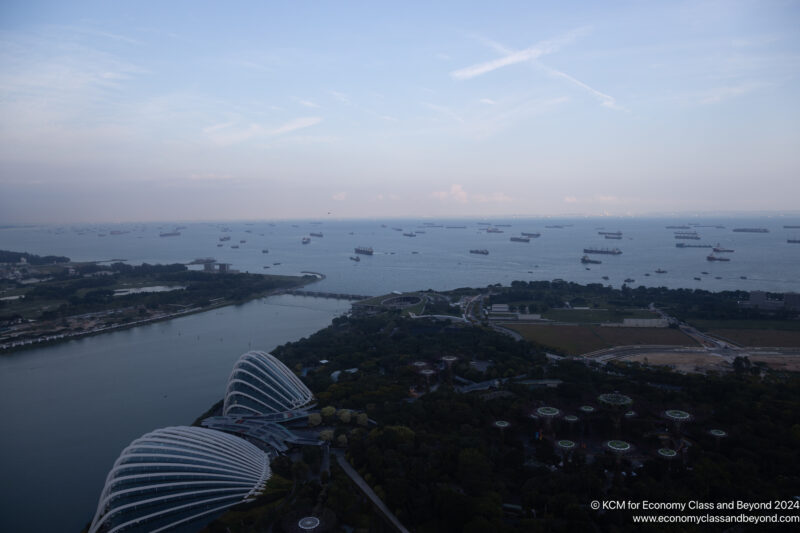 a large body of water with many boats in the water