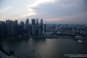 a city with tall buildings and a body of water