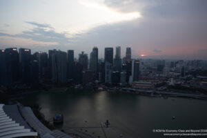 a city skyline with a body of water