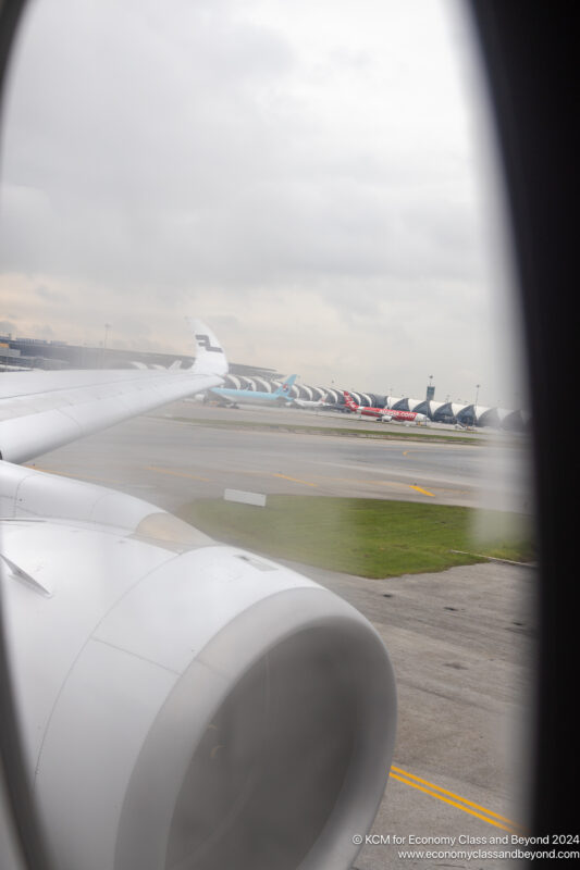 an airplane wing on a runway