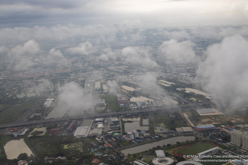 aerial view of a city with clouds