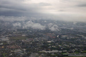 aerial view of a city with clouds