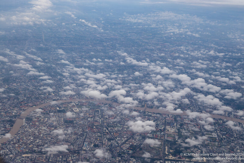 aerial view of a city with clouds