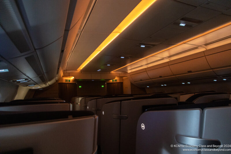 a row of chairs in an airplane