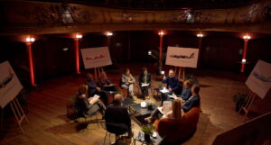 a group of people sitting in a circle