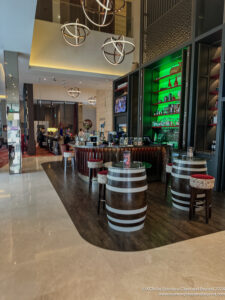 a bar with a counter and stools