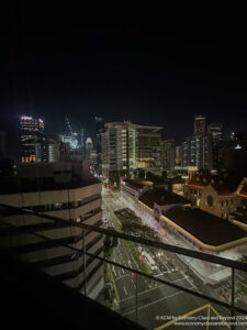 a city at night with buildings and a street