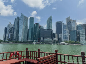 a city skyline with a body of water