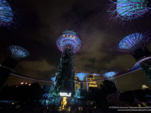 a group of tall buildings with lights