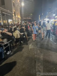 a crowd of people on a street