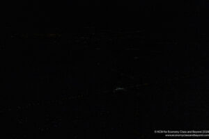 a black sky with many lights