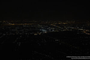 a city at night from above