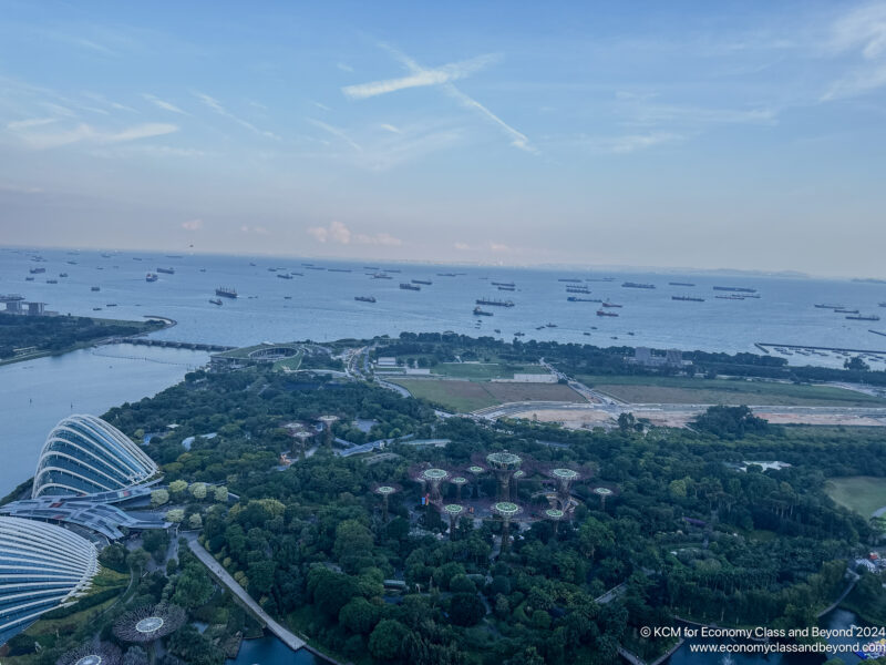 a aerial view of a city and water