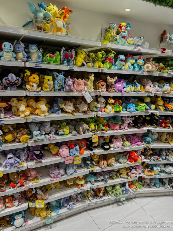 a shelf with stuffed animals