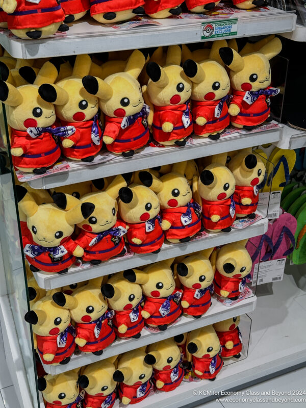 a shelf with stuffed animals