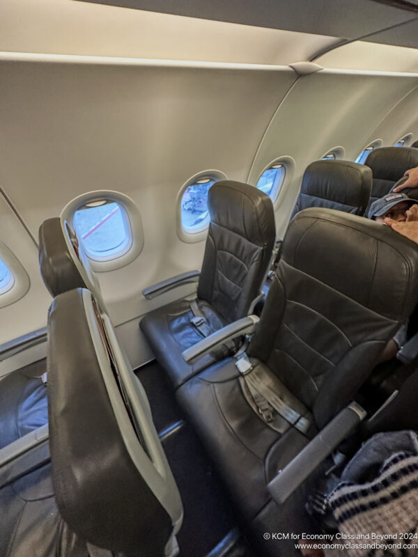 a row of seats on an airplane