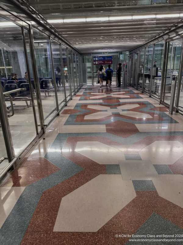 people walking on a walkway