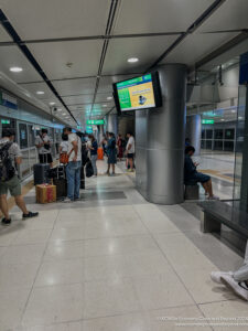 a group of people in a subway station