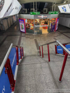 a staircase leading up to a store