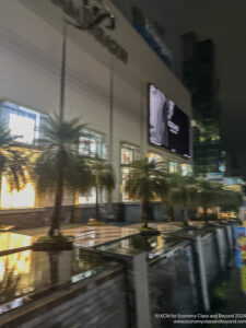 a building with palm trees