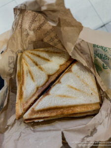 a sandwich in a paper bag