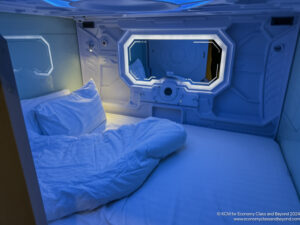 a bed with a window in the back