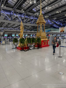 a woman walking in an airport