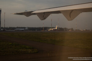 an airplane wing on a runway