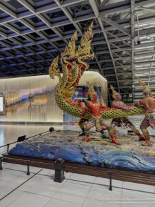 a statue of a dragon in a building